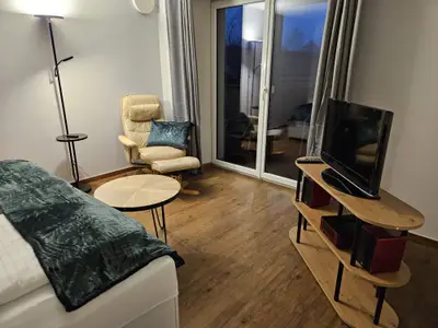 Schlafzimmer mit Balkonzugang