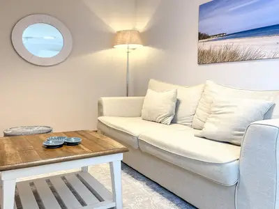 Wohnzimmer mit Sitzgelegenheit