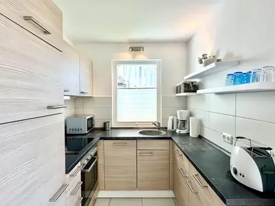 Moderne Küche mit hochwertigen Geräten für alle Kochliebhaber!