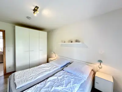 Gemütliches Schlafzimmer ideal für erholsame Nächte.