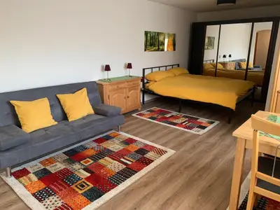 Schlafcouch und Doppelbett