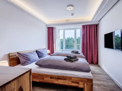 Schlafzimmer: 1 Doppelbett (160x200), TV