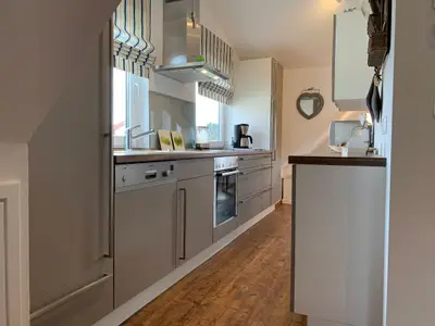 Gut ausgestattete Küche