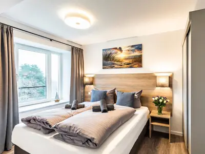 Schlafzimmer 1: Doppelbett (160x200), TV