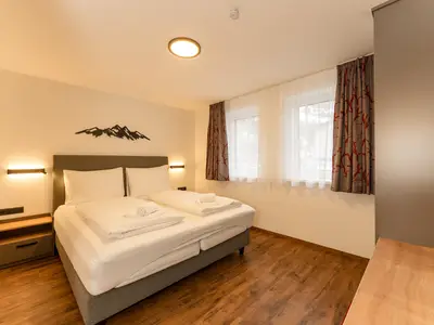 Schlafzimmer 1 mit TV