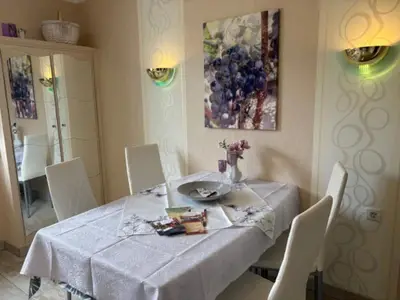 Carina-Kueche-Sitzgruppe-scaled-c261fa2c