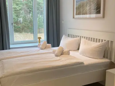 Schlafzimmer 2: Doppelbett (160x200),