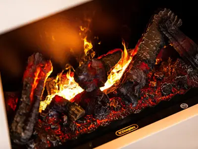 Wohn/Essbereich: Schlafcouch, Sitzbereich, Essbereich, Elektrokamin mit Heizfunktion, TV