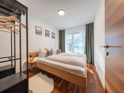 Schlafzimmer mit Terrasse- und Panoramablick