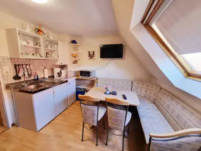 Sitzecke mit Küchenzeile