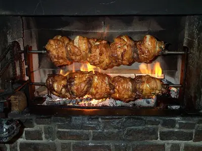 gegrillte Hendl vom Kamin