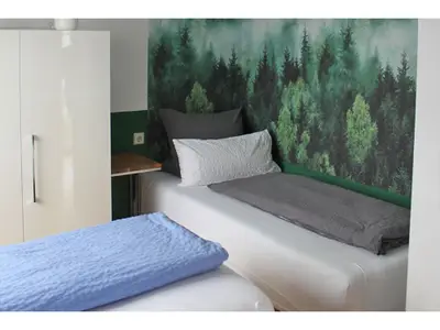 Schlafzimmer mit Doppelbett und Einzelbett, Fewo Himmelsblick