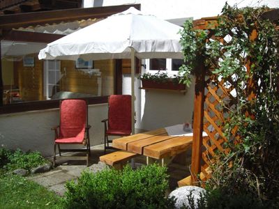 Terrasse mit Wintergarten