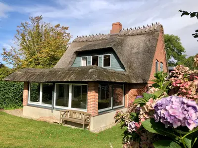 Landhaus mit eingezäuntem Garten