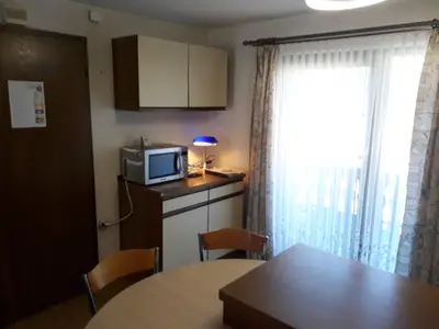 Ausgang zum überdachten Balkon