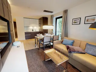 Luxusapartment mit eigener Sauna & Sonnenbalkon – nur Minuten vom Strand entfernt