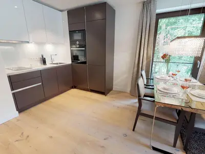 Luxusapartment mit eigener Sauna & Sonnenbalkon – nur Minuten vom Strand entfernt