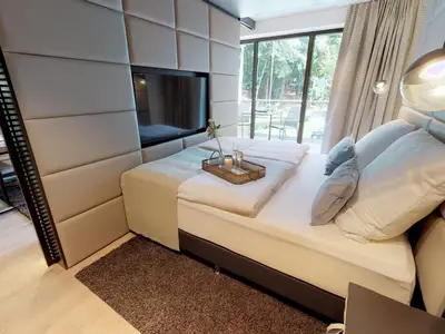 Luxusapartment mit eigener Sauna & Sonnenbalkon – nur Minuten vom Strand entfernt