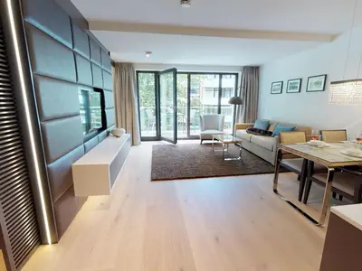 Luxusapartment mit eigener Sauna & Sonnenbalkon – nur Minuten vom Strand entfernt