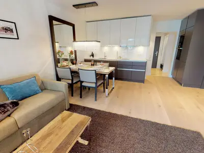 Luxusapartment mit eigener Sauna & Sonnenbalkon – nur Minuten vom Strand entfernt