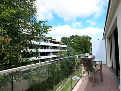Luxusapartment mit eigener Sauna & Sonnenbalkon – nur Minuten vom Strand entfernt