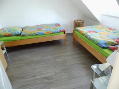 Schlafzimmer zwei Einzelbetten