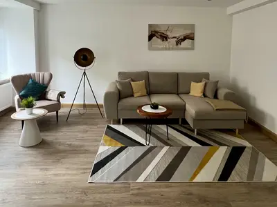 Wohnzimmer mit Schlafsofa