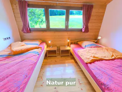 Zimmer Himmelreich (3 Personen) mit Blick auf die Scheuermattwiese und den Tannenwald
