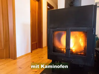 gemütlicher Kaminofen nach der Wanderung oder Skitour