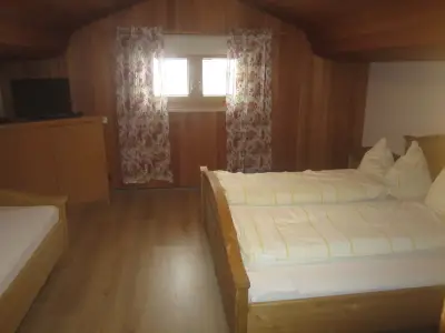 Schlafzimmer 3 Betten Studio Apartment