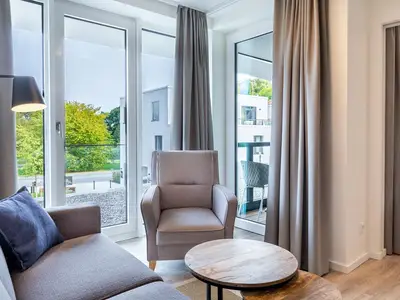 Wohn-Essbereich mit Zugang zur Loggia