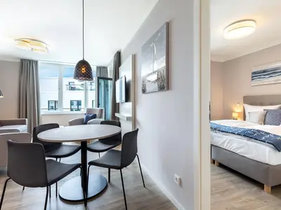 Wohn-Essbereich mit Zugang zur Schlafzimmer