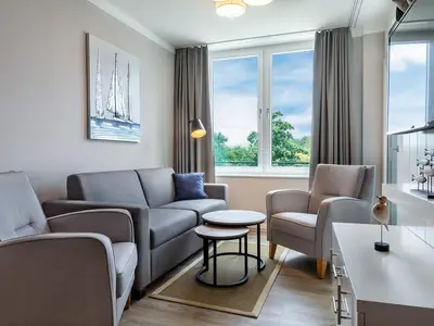 Wohn-Essbereich mit Zugang zur Loggia