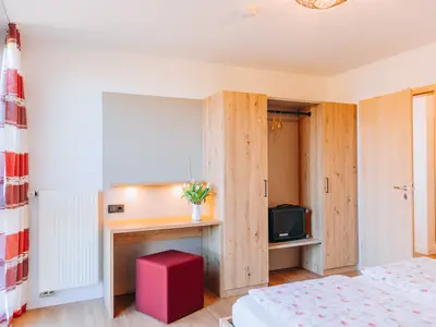 Elternschlafzimmer der Wohnung Kirsche
