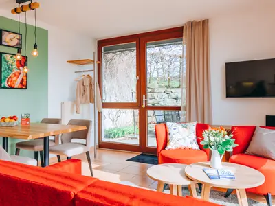 Wohn-und Essbereich der Wohnung Apfel