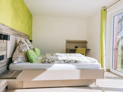 Elternschlafzimmer der Wohnung Kiwi