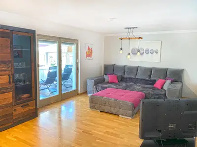 Der Wohnbereich in der Ferienwohnung Malerheim