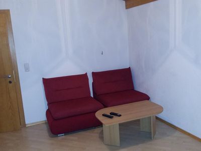 Wohnzimmer mit Schlafsofa