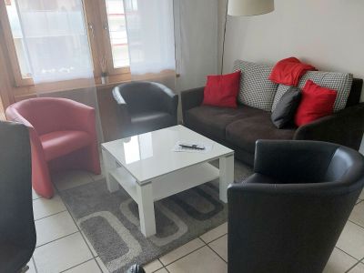 Ferienwohnung Davos Caplan Ledermann - Wohnzimmer