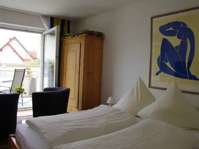 Schlafzimmer mit Balkon