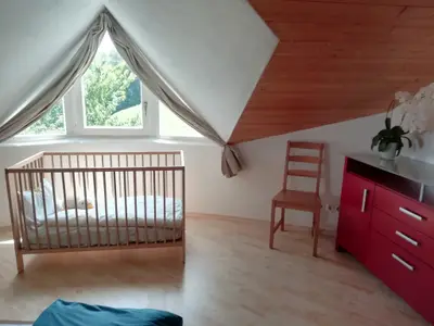 Schlafzimmer "Bergblick" mit Babybett