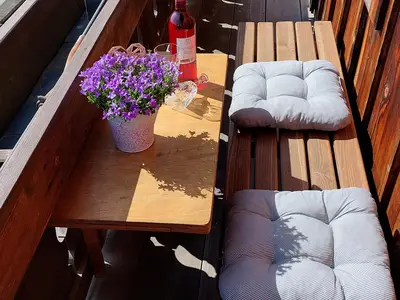 Balkon mit Sitzgelegenheit