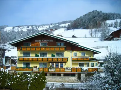 Haus-ortsblick-winter-wagrain-apartments