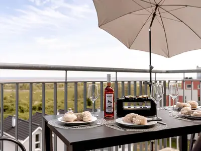 Balkon mit direktem Blick auf das Wattenmeer