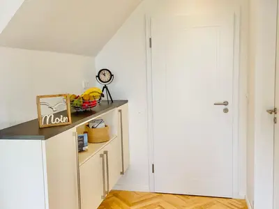 Der Weg zum Bad und Schlafzimmer.