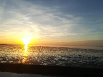 Sonnenuntergang von der Wattseite