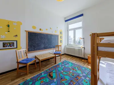 Ferienwohnung Oase am See Waren (Müritz) - Schlafzimmer mit Spielecke