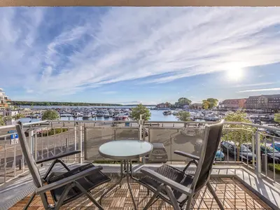 Ferienwohnung Hafenglück Waren (Müritz) -  Balkon mit Sonnenuntergang