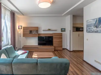 Ferienwohnung Kleines Meer Wohnzimmer mit Blick zum TV
