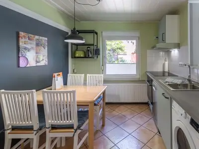 Ferienwohnung Marienkäfer Waren mit Küchenzeile und integriertem Essecke